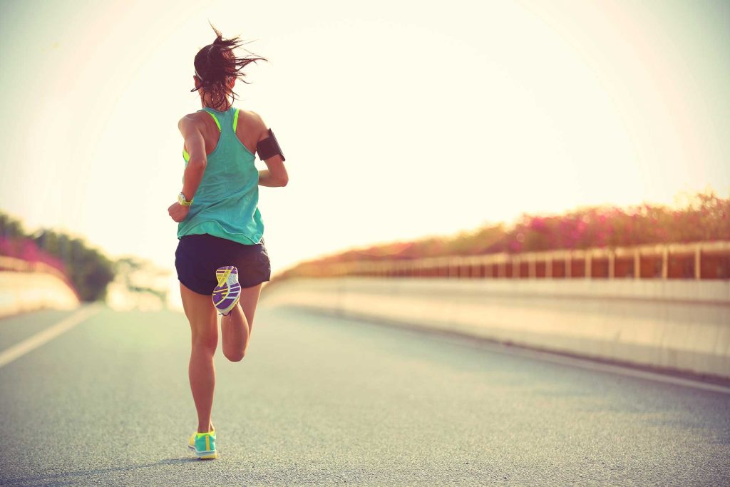 Woman running for wellness care